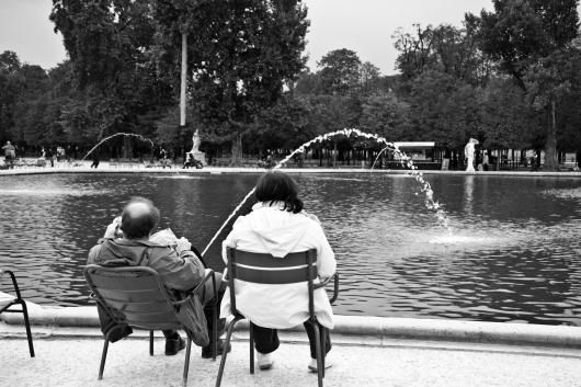 A couple relaxing in the garden des tuileries in Paris October 2010.